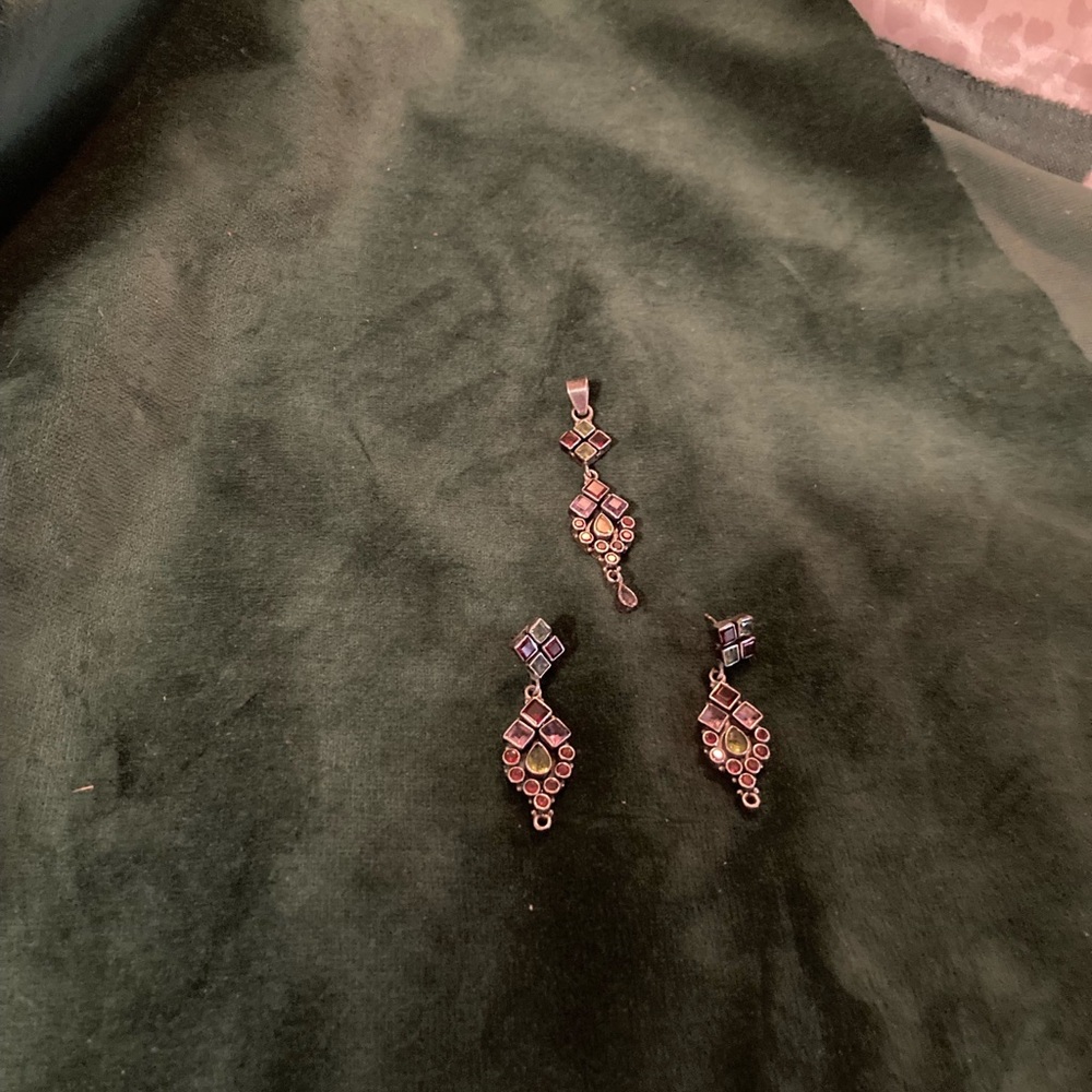 Earrings and matching necklace less chain